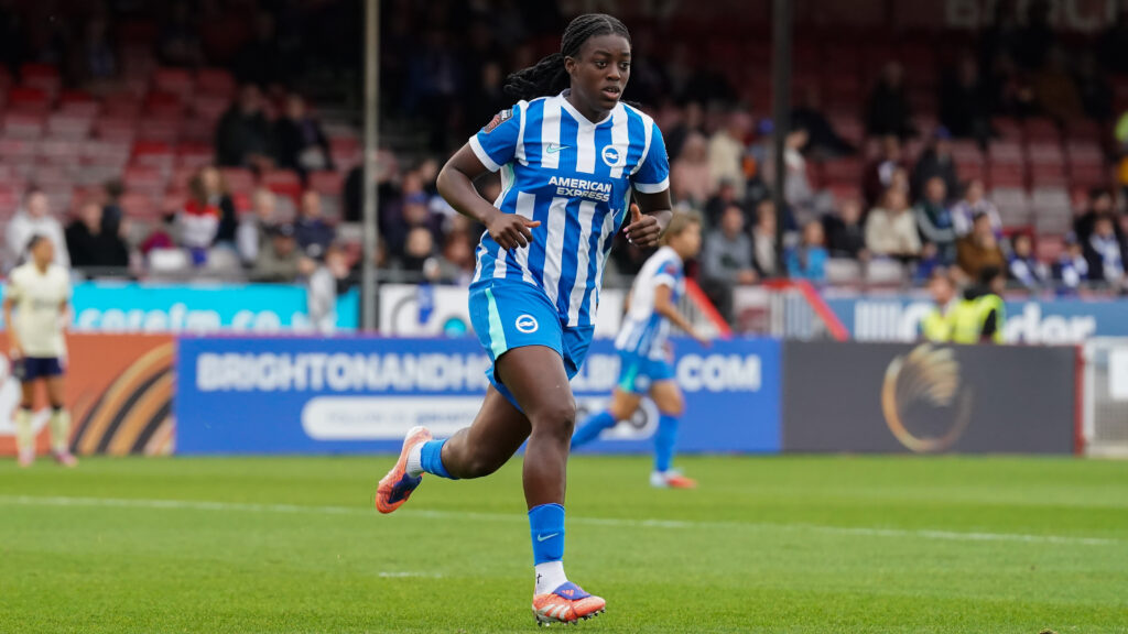 Brighton WSL defeat: A Brighton & Hove Albion Women player running on the pitch during a match.