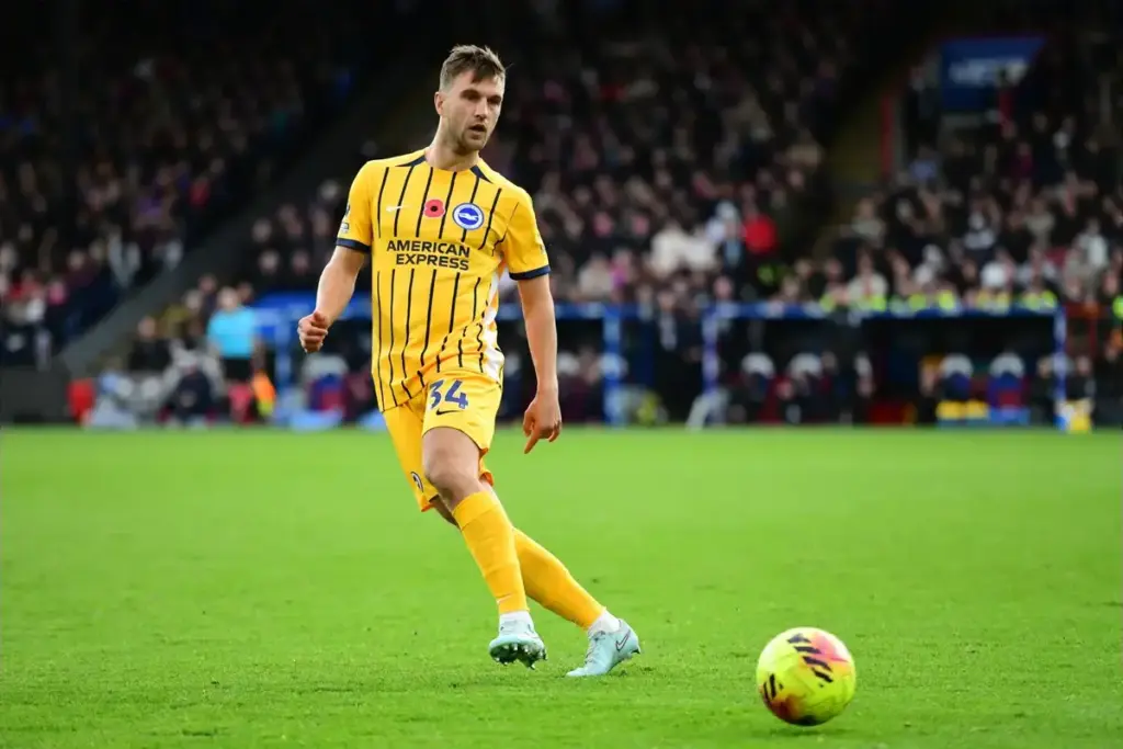 Joel Veltman waves goodbye to Brighton fans as his West Ham move closes in