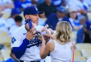 July 6, 2026, Los Angeles, California, USA: Freddie Freeman #5 of the Los Angeles Dodgers is handed his first daughter, London Rosemary Joy, by wife Chelsea during pregame ceremonies at an MLB regular season game between the Los Angeles Dodgers and t